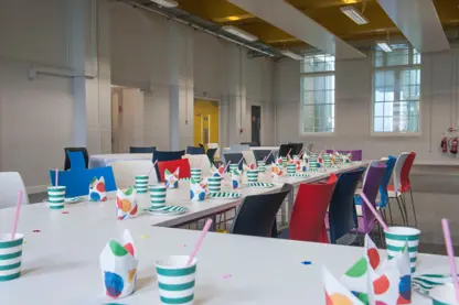 Yellow hall setup up for eating